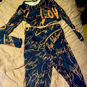 2 piece set. Long sleeve crop top. Pants are leggings material. Never worn.